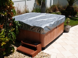 The spa cover is now protected from UV and elements by the spa cap