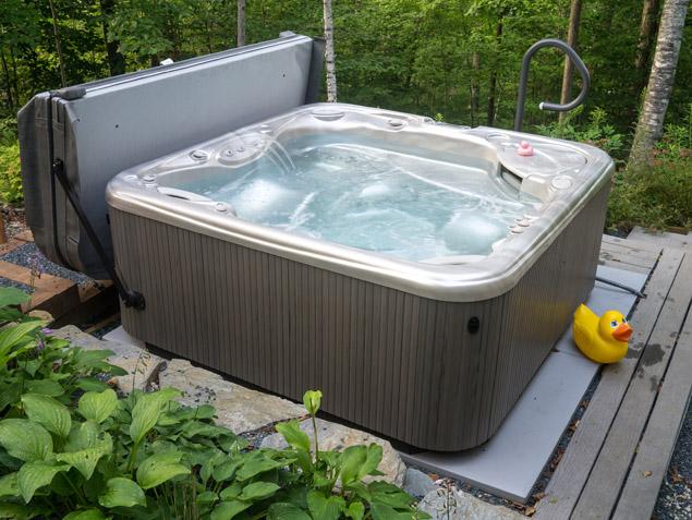 Hot tub covers in the woods
