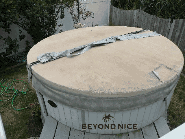 A worn out, past needing replaced, spa cover A worn out, past needing replaced, spa cover